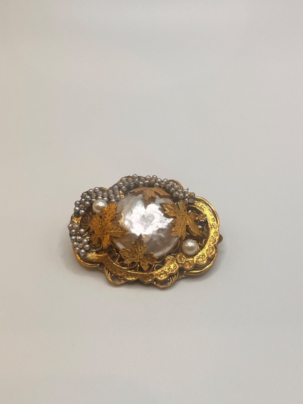 Signed Miriam Haskell 1950s Baroque Faux Pearl Seed Pearl Gold-Tone Brooch